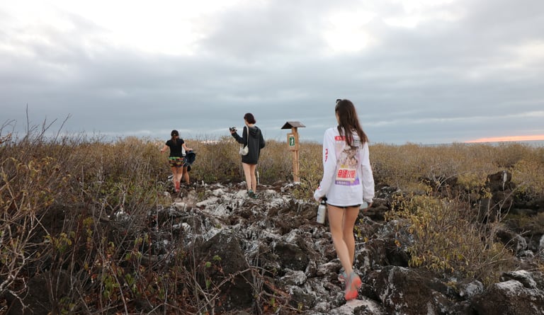 Family exploring Galápagos during a luxury cruise excursion
