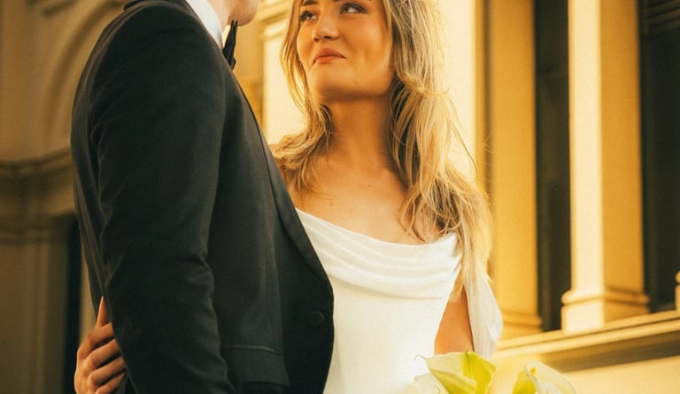 Editorial wedding couple portrait with warm light at Carlton Gardens Melbourne