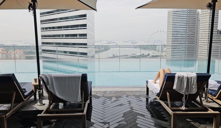 Andaz Singapore rooftop infinity pool with panoramic city skyline views