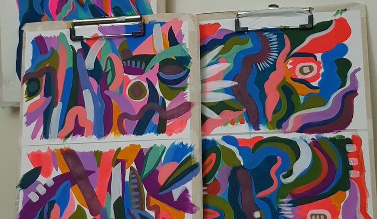 close up of 4 abstract acrylic paintings
