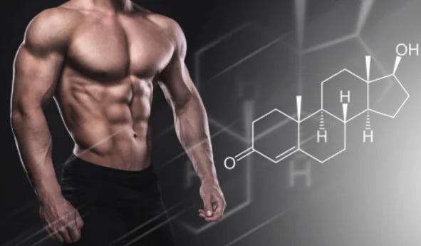 Homem musculoso exibindo abdômen definido, com fórmula química da testosterona ao lado.