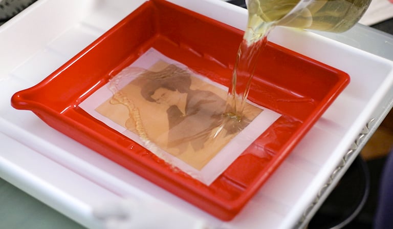 The print with the Platinum solution is revealed in our photographic workshop