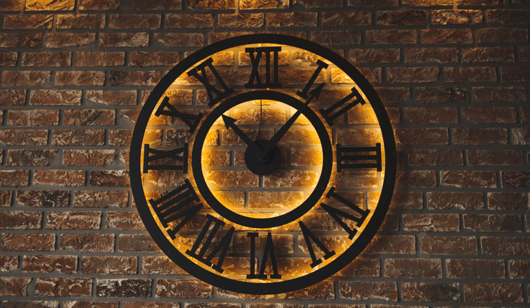 Old clock on a brick wall