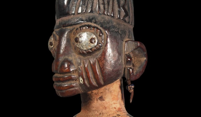 ibeji-signification-symbolisme-metal-yeux-jumeaux-ibedji-iron-gun