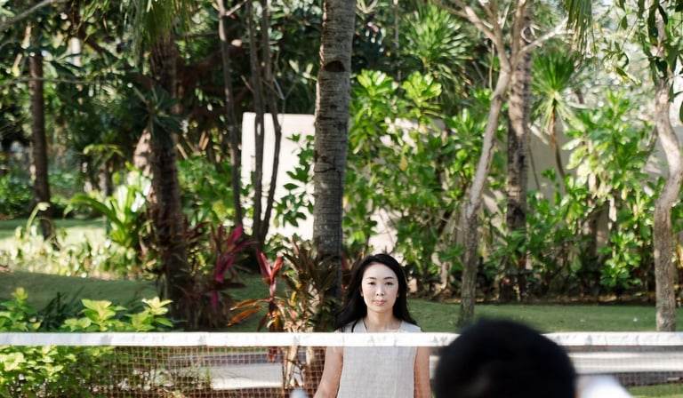 Intimate proposal moment in tropical garden at Sofitel Nusa Dua Bali