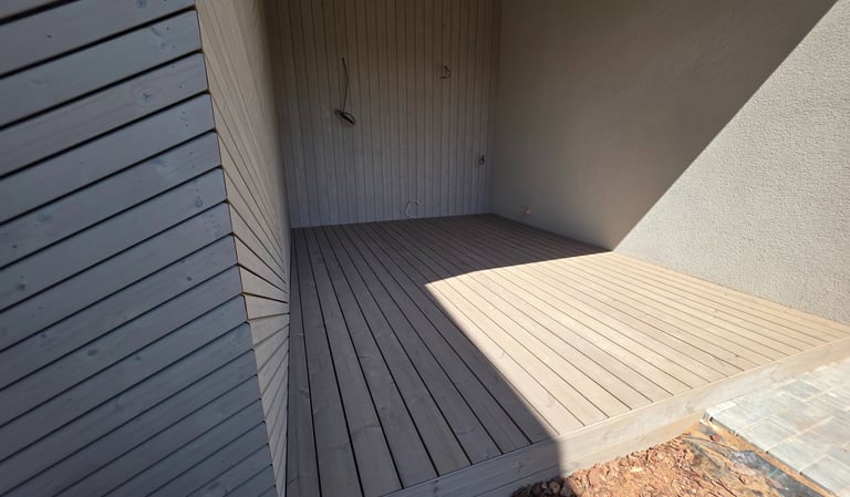 a wooden deck with a wooden decking area and a wooden deck