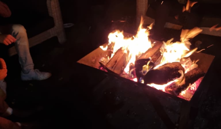People standing around our firepit that we sell