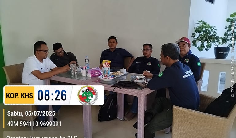 a group of men sitting around a table