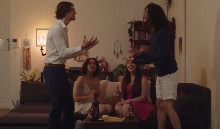 a man and woman standing in a living room