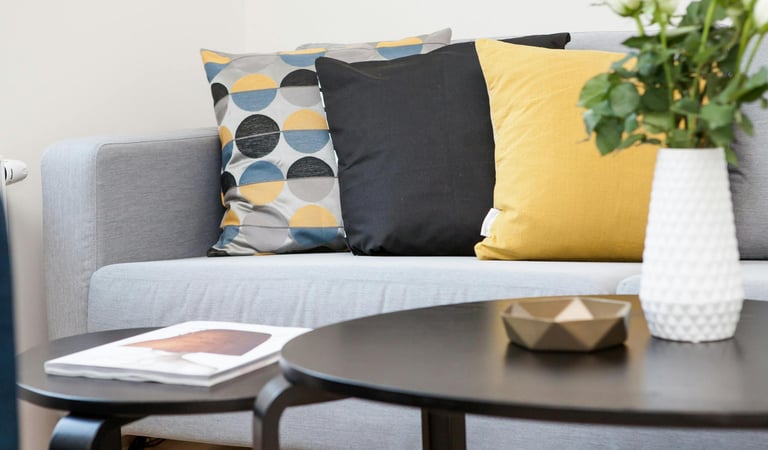 Cozy and fresh living room setup after a detailed cleaning session by KLEAN WELL