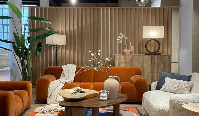 a living room with a couch and a table