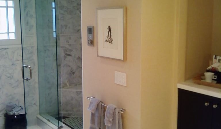 Custom tile installation around shower walls and bathroom flooring in Glenview IL.
