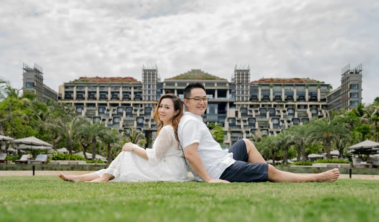 Couple portrait on the Ocean Lawn with The Apurva Kempinski Bali as the backdrop