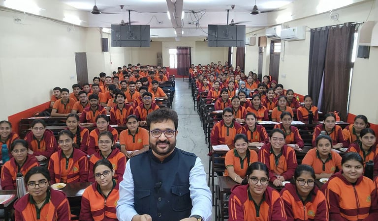 Mentor with a large group of students in a classroom setting.