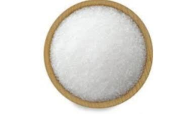 Hand-carved pink salt tealight holder creating a soothing, ambient candlelight effect