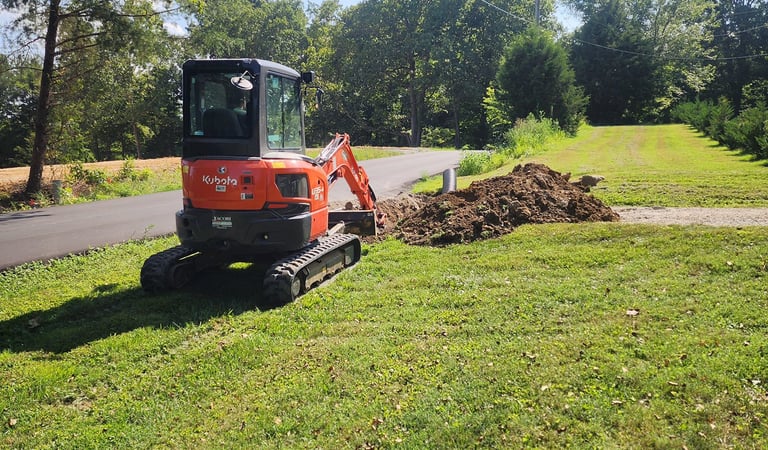 Drainage work to prevent standing water on property