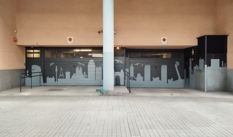 pintura mural graffiti parking garaje bloque edificio entrada vecinos comunidad propietarios
