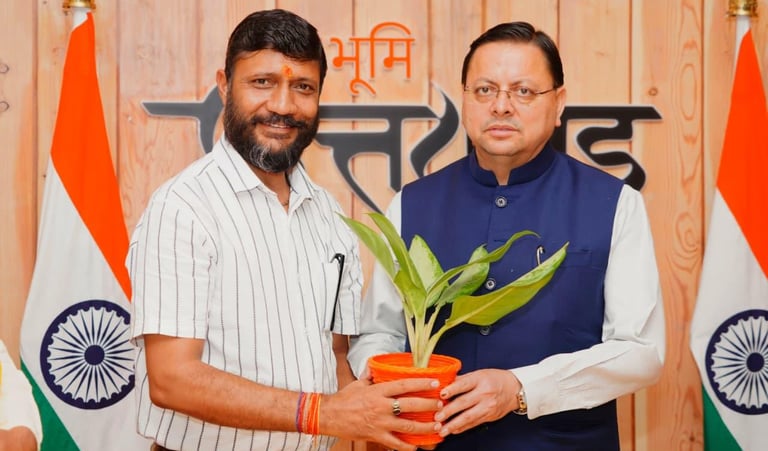 Santosh Khanduri with Chief Minister Dhami