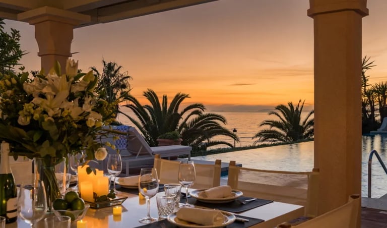 Sunset poolside dinner at Villa El Rincon with candles