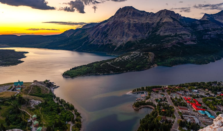 Sunrise over Upper Waterton Lake and townsite from Bear’s Hump in Waterton Lakes National Park.
