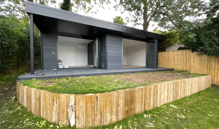 Large composite room in dark grey, used as gym