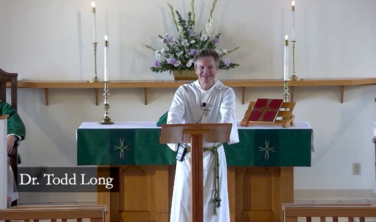 Image of Dr. Todd Long delivering homily