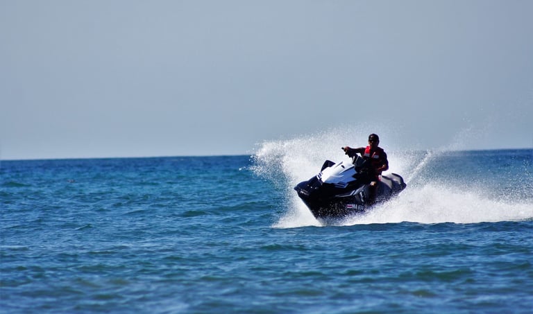 Jet ski adventure on the open ocean during luxury catamaran tour in Papagayo, Costa Rica