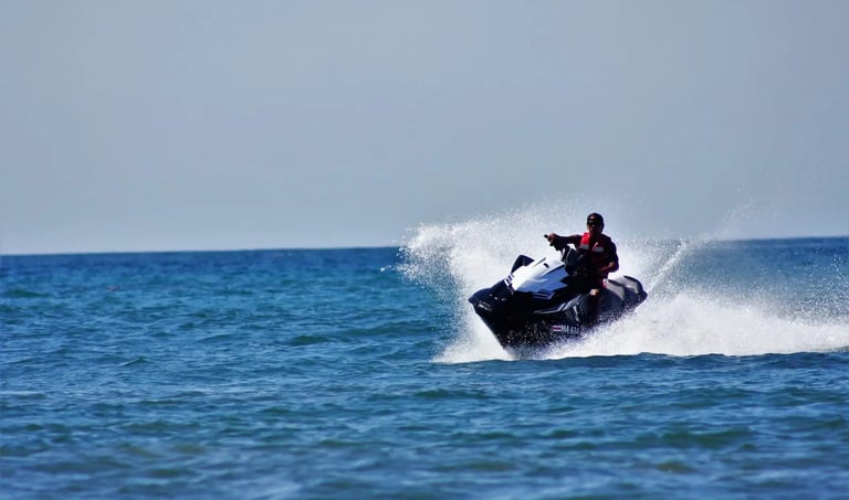 Jet ski adventure on the open ocean during luxury catamaran tour in Papagayo, Costa Rica