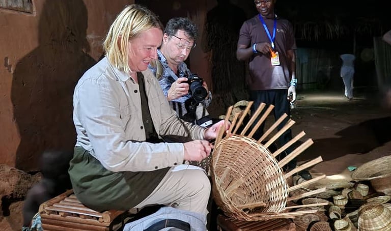 Tourist doing basket Weaving activity in Senegal