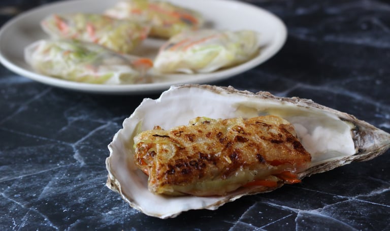 Oysters in Cabbage and Carrot Rice Rolls