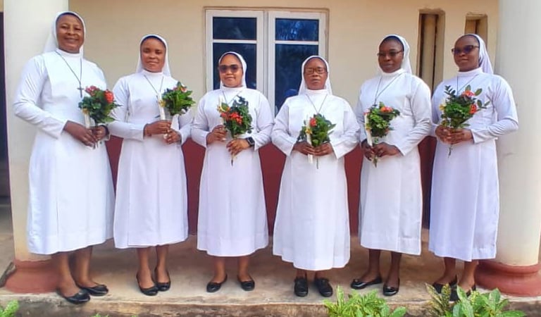 Missionary Sisters of the Divine Image standing together during renewal of vows ceremony