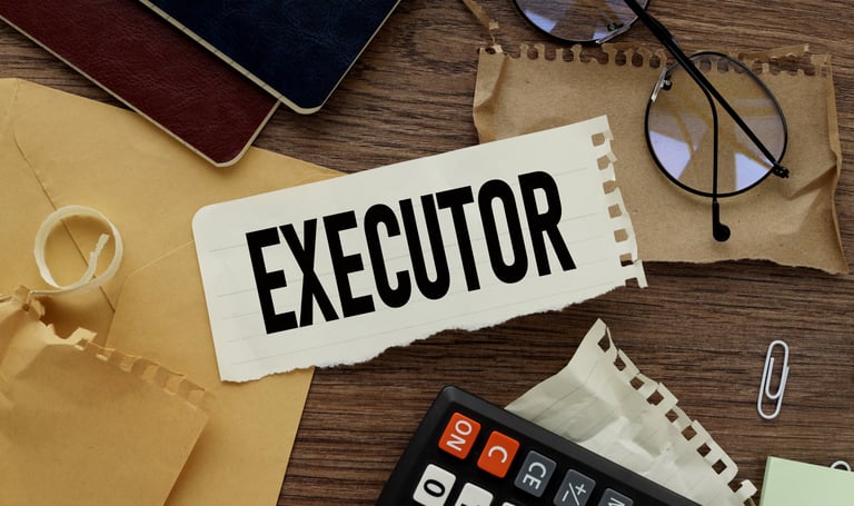 office desk with a piece of paper in middle marked 'executor'