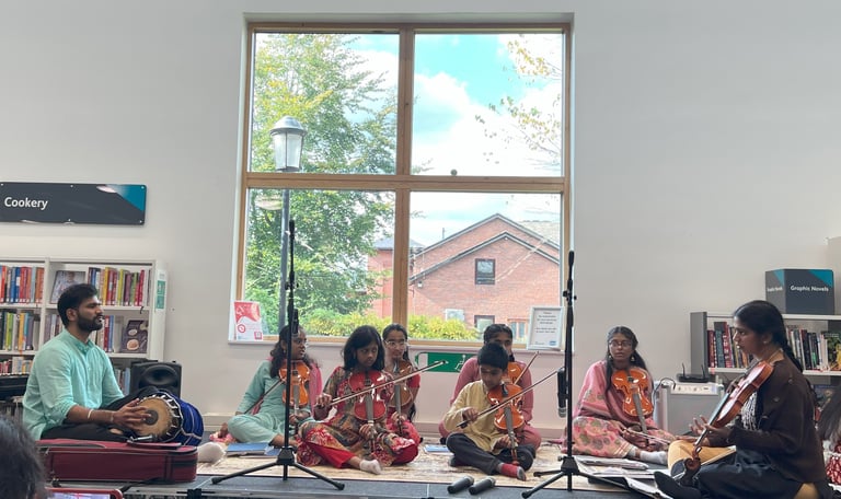 A picture of children performing in library
