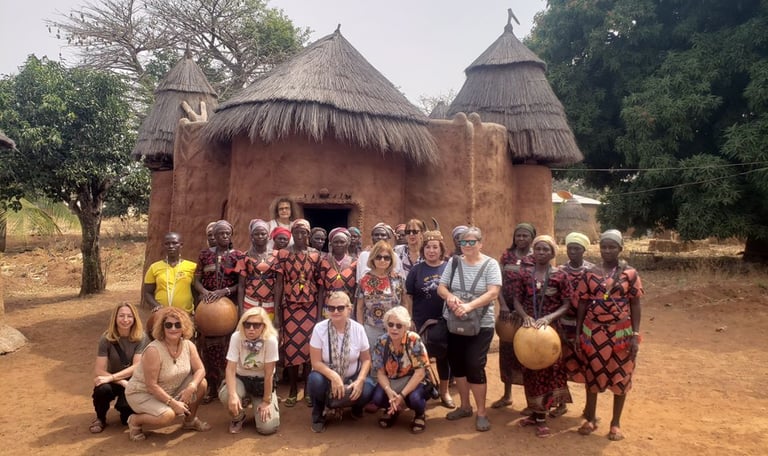 A group of Tourists visiting Tata Somba Village during a Multi-country Trips of Benin, Togo & Ghana