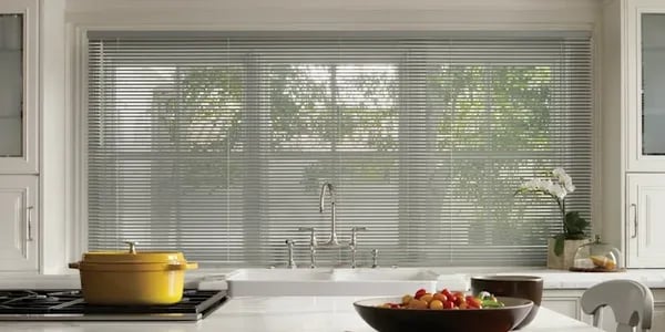 kitchen window with light-filtering blinds above sink – Rise Up Window Coverings Milwaukee
