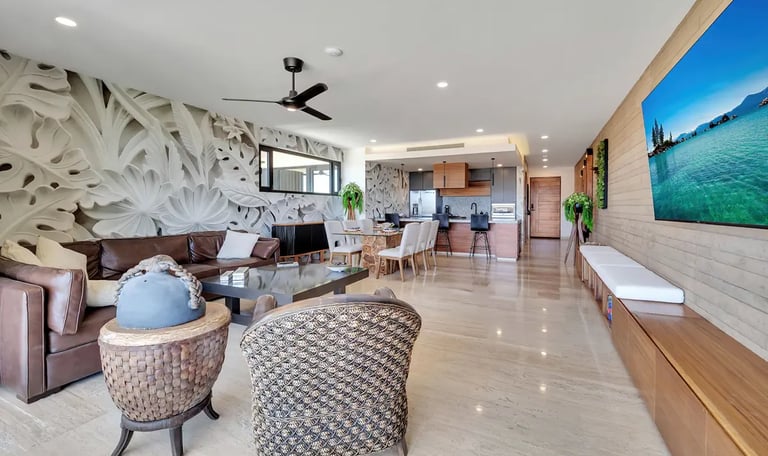 Professional photography of a spacious, open living room in a Los Cabos luxury condo.
