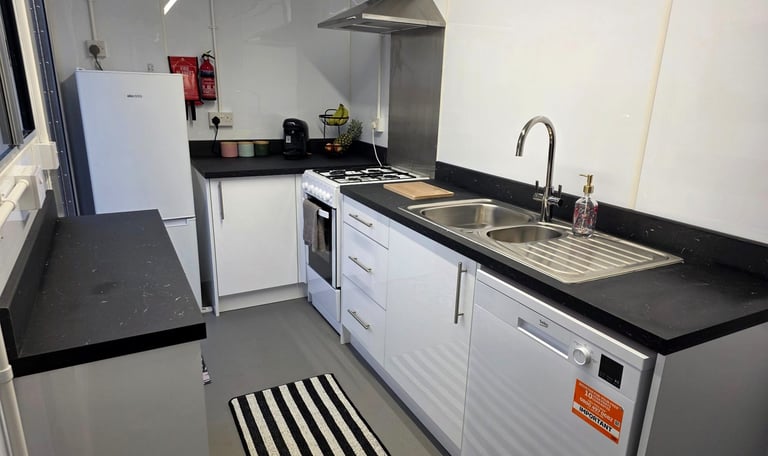 Full interior of a fully equipped temporary kitchen pod available for rental during insurance claims and renovation projects.