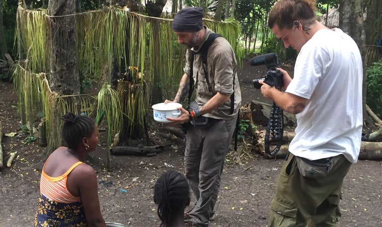 Tourists making video in the remote village in Photography Tours in Benin