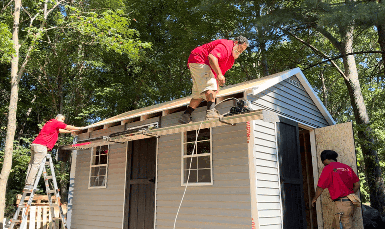 Shed installation in progress by Imperial Custom Sheds crew at customer’s house in Rhode Island