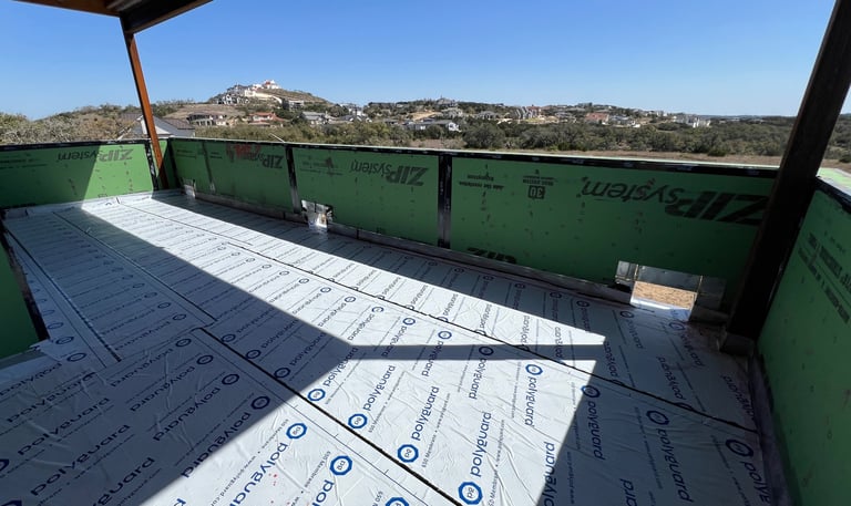 Roof terrace after applying permitter flashing and waterproofing.