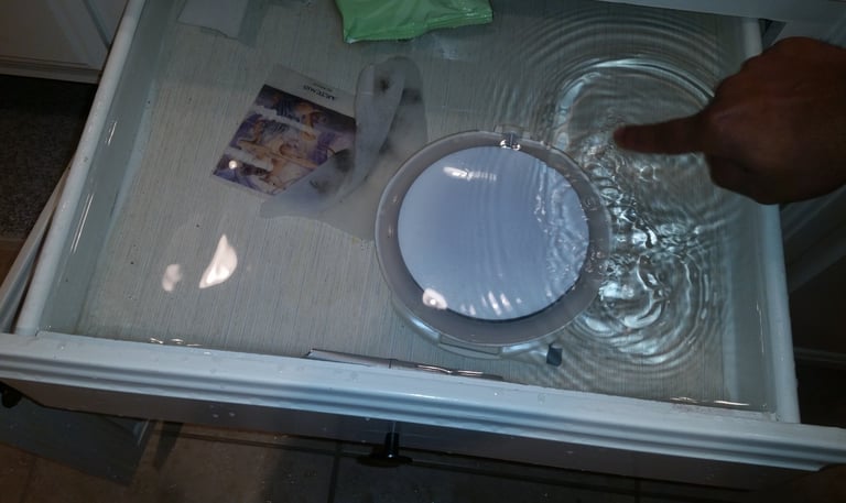 water-damage-restoration-in-pflugerville-kitchen-flooded-with-water