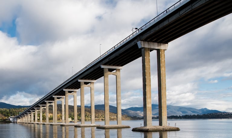 tasman bridge with water and hills in background