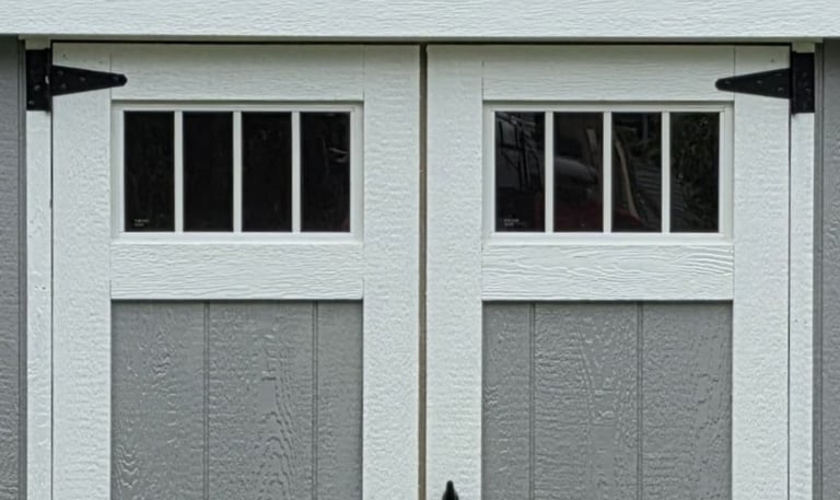 Custom shed door with transom window built in Halifax, Massachusetts showcasing craftsmanship and design.