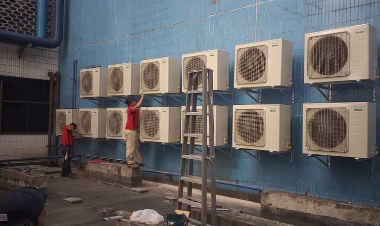 Suasana Aircond installation services Selangor commercial HVAC Daikin unit repair.