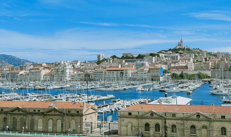 Marseille with sailboat harbor buildings and ocean views