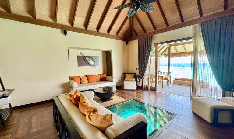 Ayada Maldives sunset ocean suite living room