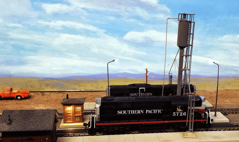 Southern Pacific Locomotives parked in the yard.