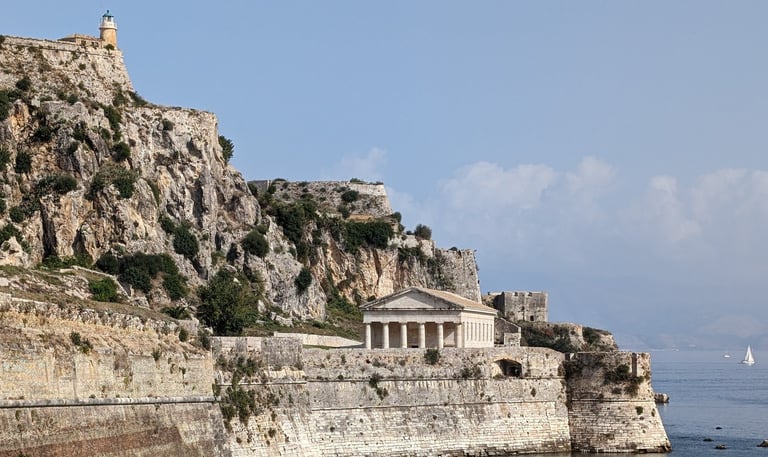 Corfu Greece St. Georges Church on rocky sea wall