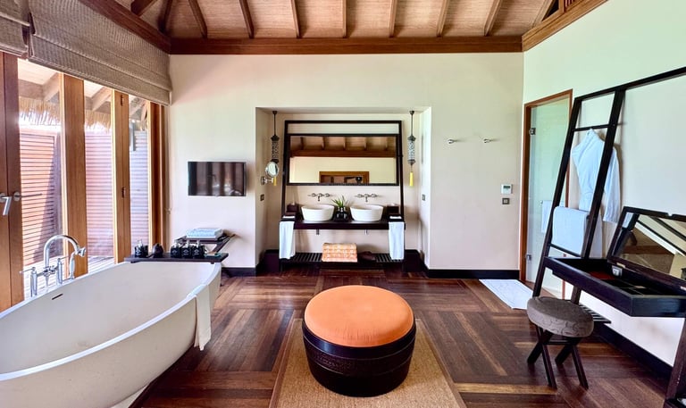 Ayada Maldives sunset ocean suite with pool bathroom