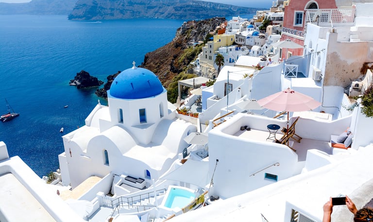 Santorini coastline from high above houses looking at water
